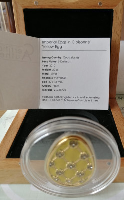 Srebrna moneta z kryształkami Bochemia.